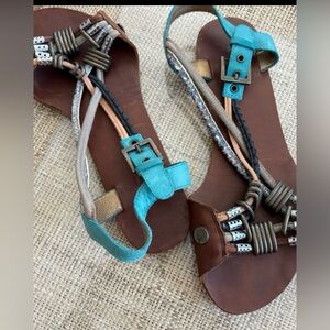 Beautiful Boho Sandals Adorned w Turquoise leather & Funky Hardware. Vero Cuoio.